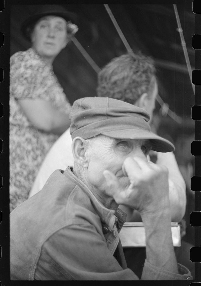 [Untitled photo, possibly related to: Spectator at an auction in East Albany, Vermont]. Sourced from the Library of Congress.