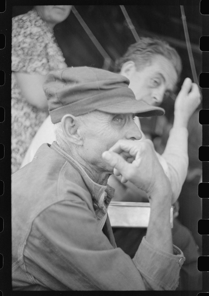 Spectator at an auction in East Albany, Vermont. Sourced from the Library of Congress.