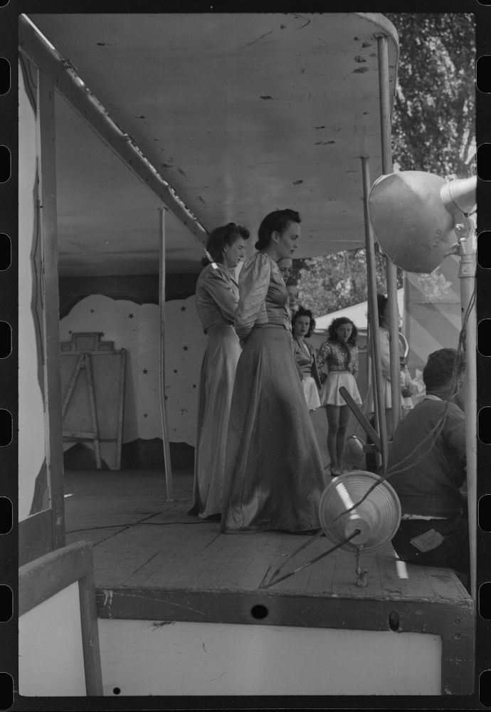 [Untitled photo, possibly related to: At a "girlie" show at the fair in Rutland, Vermont]. Sourced from the Library of…