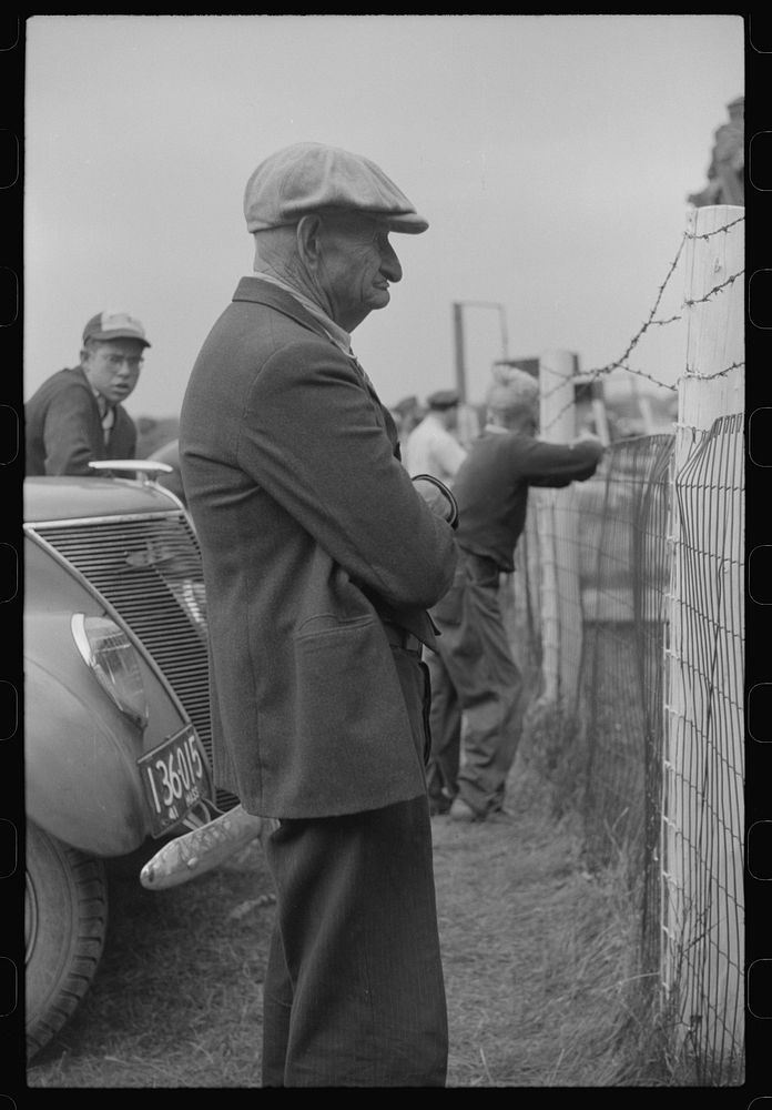 Spectator at the auto races at the Champlain Valley Exposition at Essex Junction, Vermont. Sourced from the Library of…