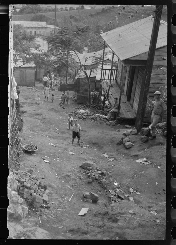 [Untitled photo, possibly related to: Yauco, Puerto Rico. Street in the slum area]. Sourced from the Library of Congress.