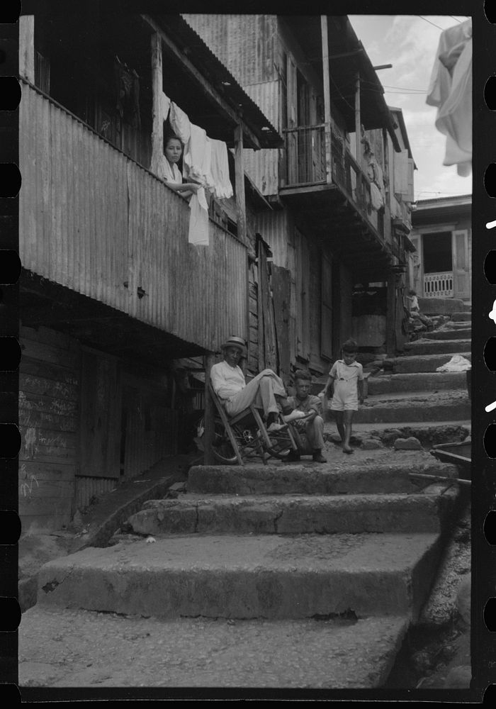 [Untitled photo, possibly related to: A street in the slum area of the hill town of Lares, Puerto Rico]. Sourced from the…
