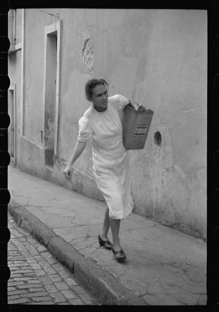 San Juan, Puerto Rico. People carrying water home because of the failure of the water system in San Juan for three days.…