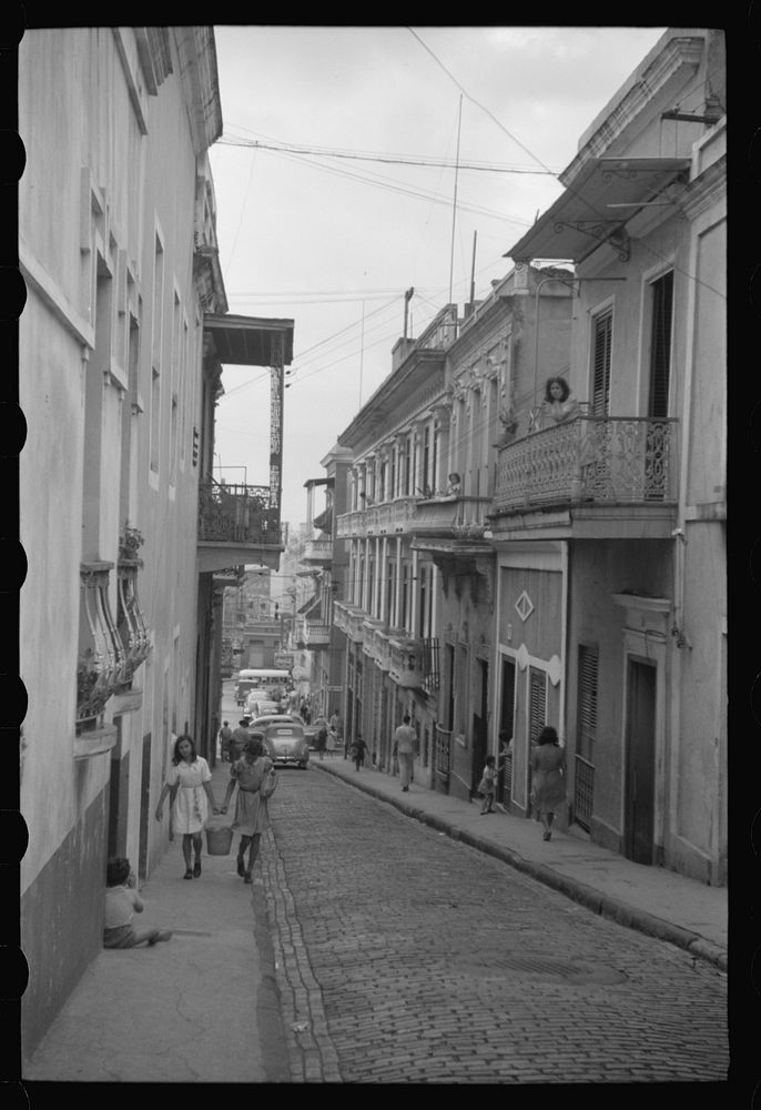 San Juan, Puerto Rico. People carrying water home because of the failure of the water system for three days. Sourced from…