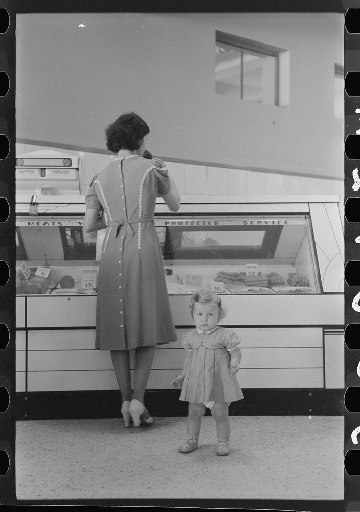 [Untitled photo, possibly related to: Shopping in coop store. Greenbelt, Maryland]. Sourced from the Library of Congress.