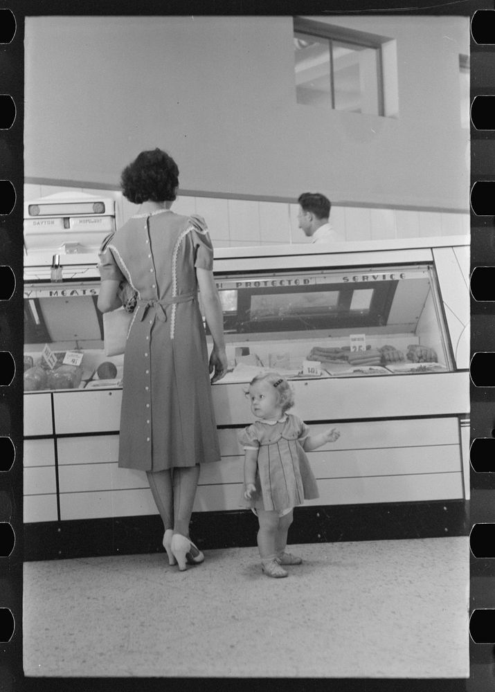 [Untitled photo, possibly related to: Shopping in coop store. Greenbelt, Maryland]. Sourced from the Library of Congress.