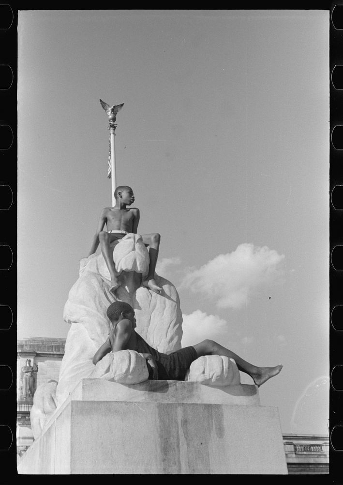 [Untitled photo, possibly related to: Colored boys playing on Columbus Monument. Washington, D.C.]. Sourced from the Library…