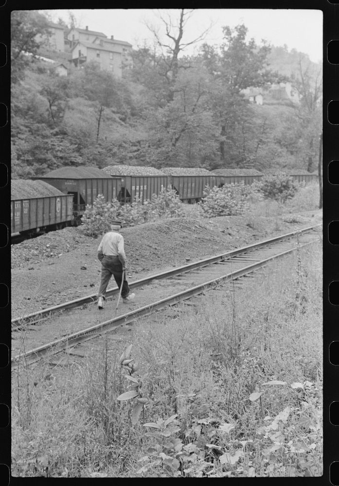 Old man, Hungarian, with cane, going home after work along tracks, Pursglove, Scotts Run, West Virginia. Sourced from the…