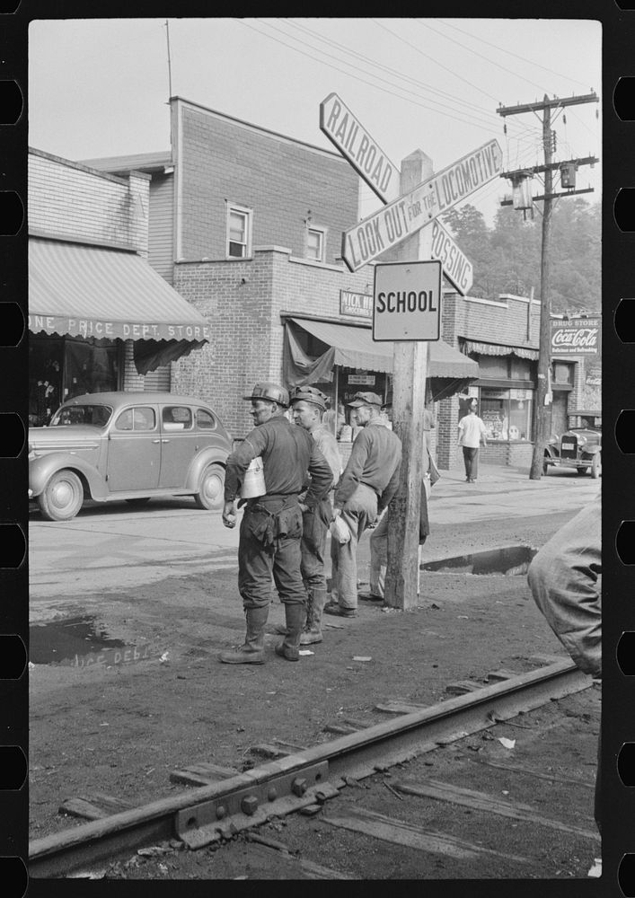 Coal miners waiting for bus to go home, Osage, West Virginia. Sourced from the Library of Congress.