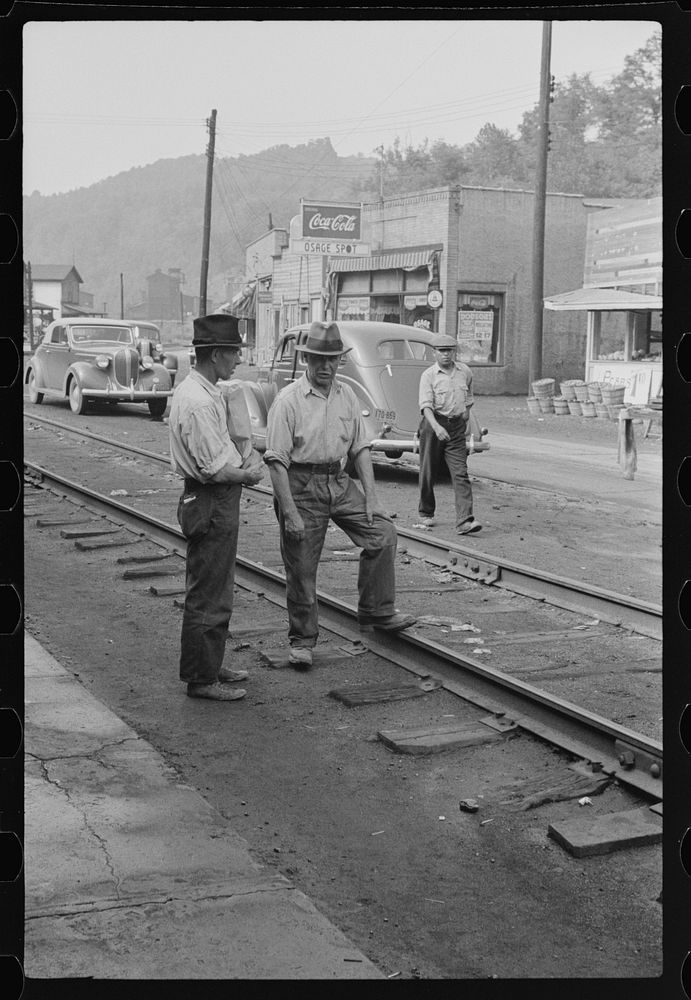 [Untitled photo, possibly related to: Coal miners waiting for bus to go home, Osage, West Virginia]. Sourced from the…