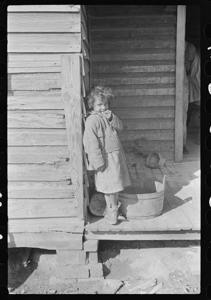 [Untitled photo, possibly related to: Child of mixed-breed Indian, white and , near Pembroke Farms, North Carolina]. Sourced…