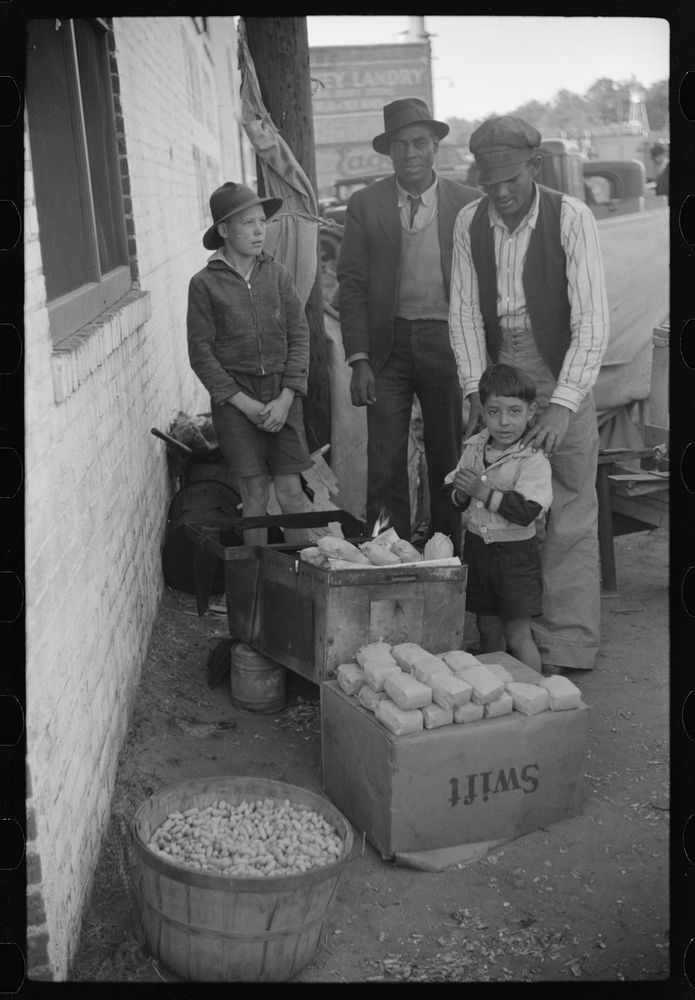 [Untitled photo, possibly related to: Selling peanuts on Saturday afternoon, Clarksdale, Mississippi Delta, Mississippi].…