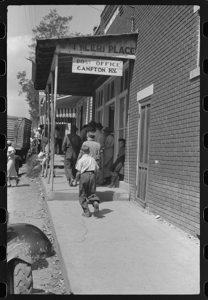 [Untitled photo, possibly related to: Farmers and townspeole on "Jockey Street" in Campton, Kentucky]. Sourced from the…