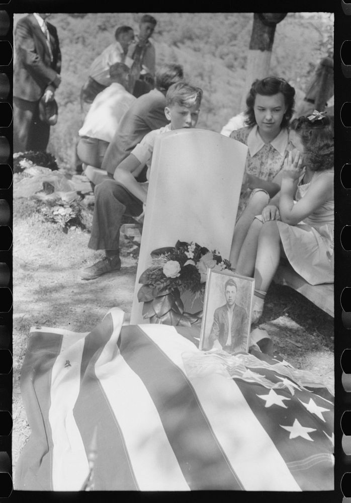 Grave decorated for a memorial meeting held annually for the deceased of each family, particularly in the summer and early…