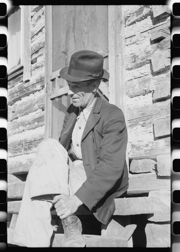 Noah Garland sitting on the steps of his son's home, Southern Appalachian Project, near Barbourville, Knox County, Kentucky.…