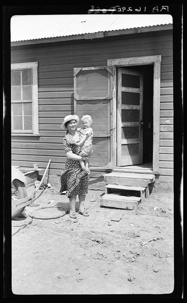 Typical Teutonic farm wife and child of Mills, New Mexico, area. Client for resettlement. Sourced from the Library of…