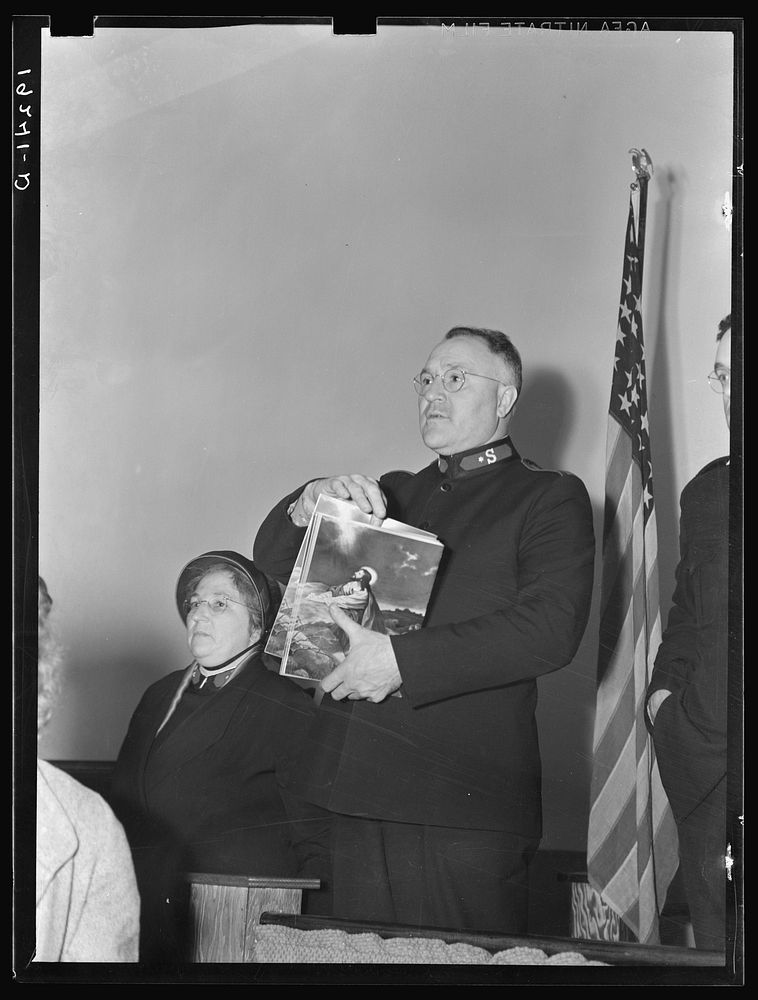 Meeting closes with adjutant Nock selling Easter edition of the "War Cry." Salvation army, San Francisco, California.…