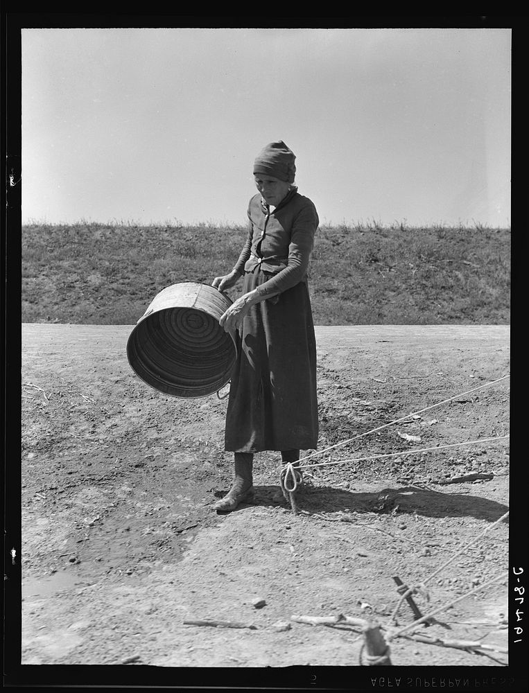 A grandmother in a migrant camp. Stanislaus County, California. "Been in California fourteen months. From Oklahoma. The main…