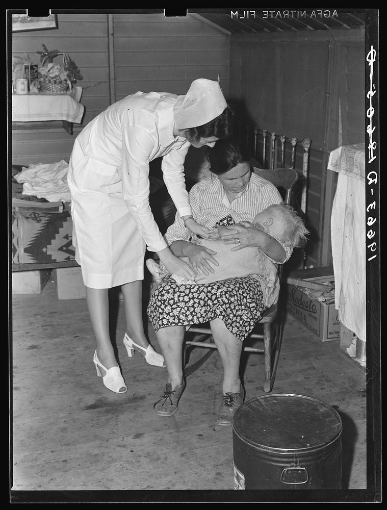 Tulare County, California. Farm Security Administration (FSA) camp for migratory agricultural workers at Farmersville. Nurse…