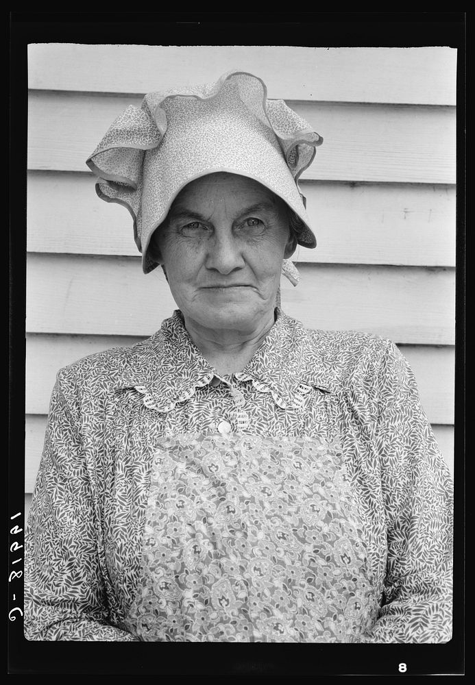 [Untitled photo, possibly related to: Member of the congregation of Wheeley's church who is called "Queen." She is wearing…
