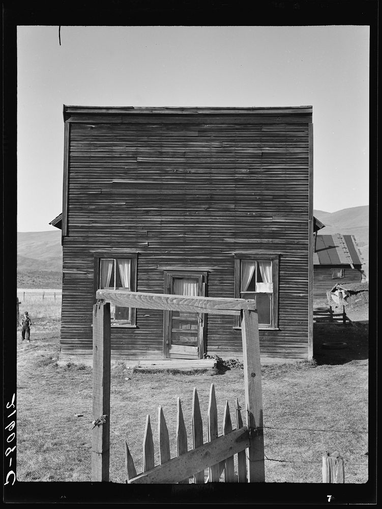 Member of the Ola self-help sawmill co-op lives in this former saloon and stagecoach tavern. Gem County, Idaho. General…