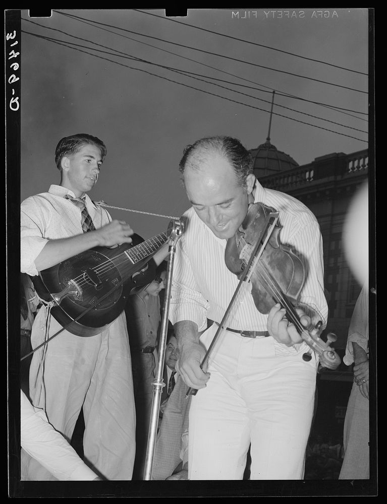 Musicians in Cajun band contest, National Rice Festival, Crowley, Louisiana. Most of the music was of the folk variety…