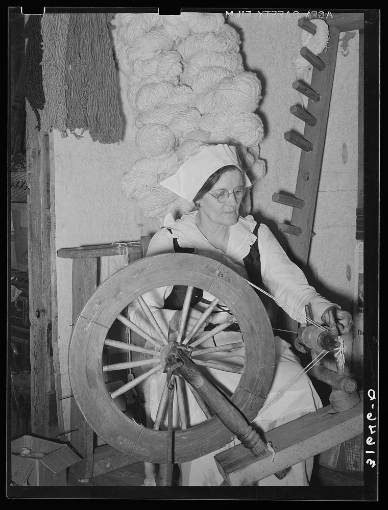 Madame Dronet twisting two strands of thread into one. Erath, Louisiana by Russell Lee