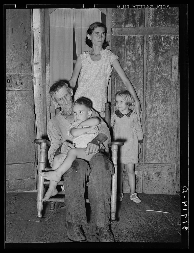 Grandfather, mother, and children. A family living near Lutcher, Louisiana by Russell Lee