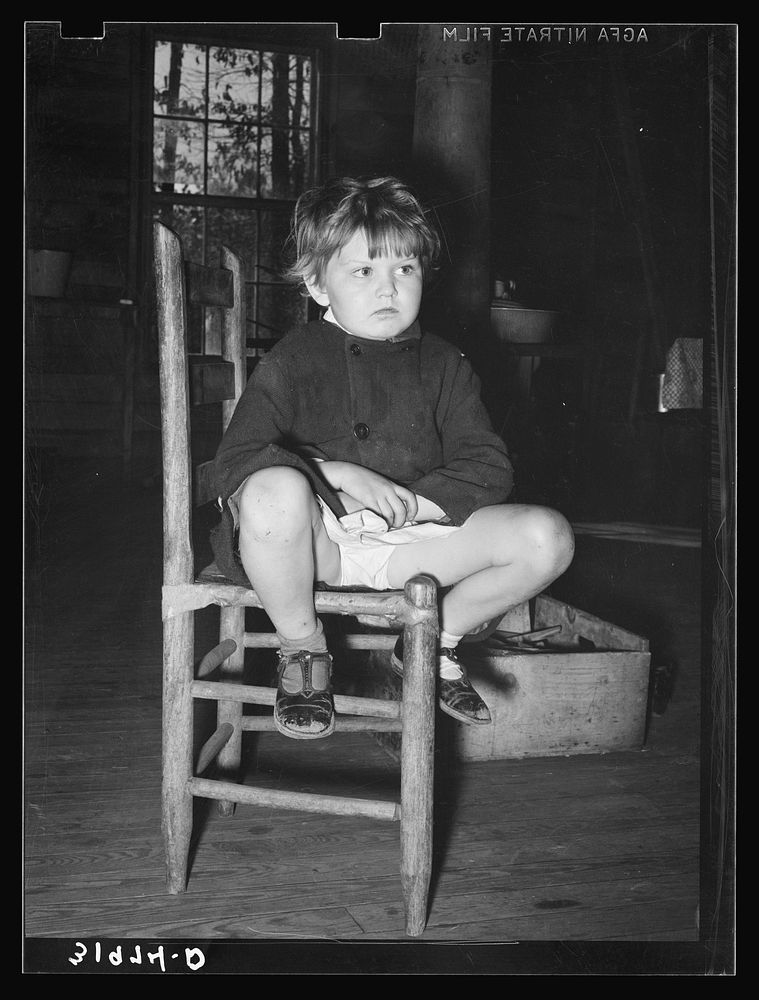 Child of family living in abandoned church near Laurel, Mississippi by Russell Lee