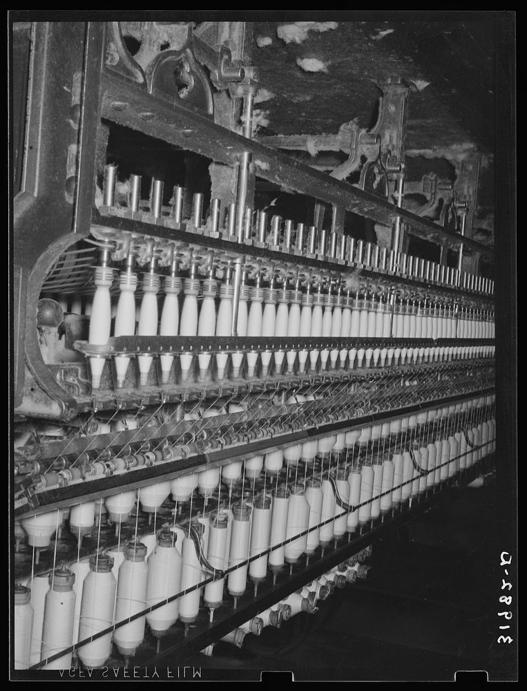 [Untitled photo, possibly related to: Thread-making machinery. Laurel cotton mill, Laurel, Mississippi] by Russell Lee