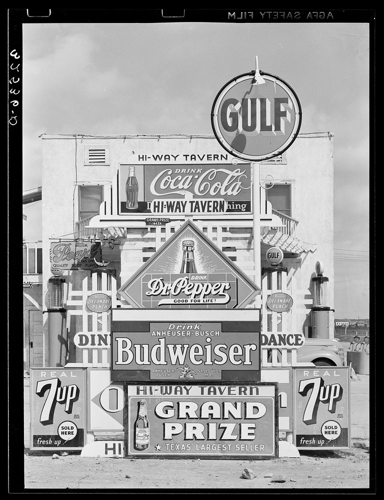[Untitled photo, possibly related to: Signs in front of highway tavern. Crystal City, Texas] by Russell Lee