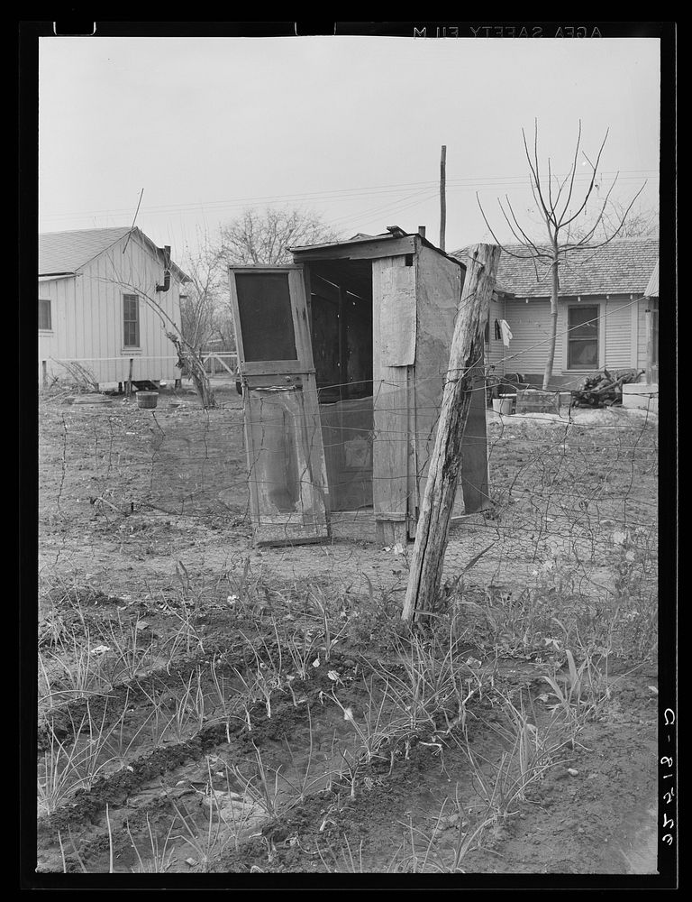 Gardens planted close to privies. Mexican section, San Antonio, Texas. Possible source of typhoid by Russell Lee