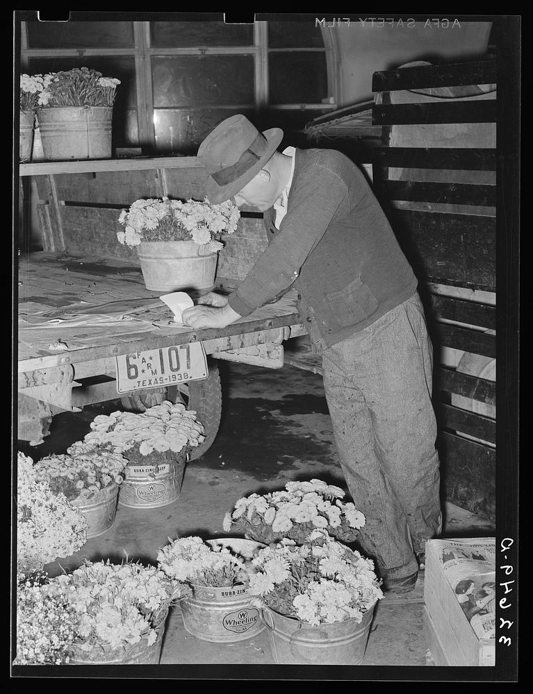 Flower peddler at the early morning market. San Antonio Texas by Russell Lee