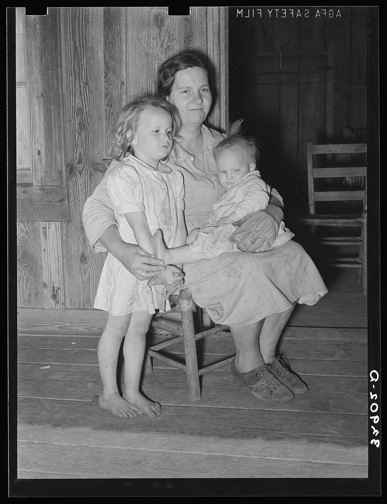 Farm mother with her two children. San Augustine County, Texas. This entire family has hookworm by Russell Lee