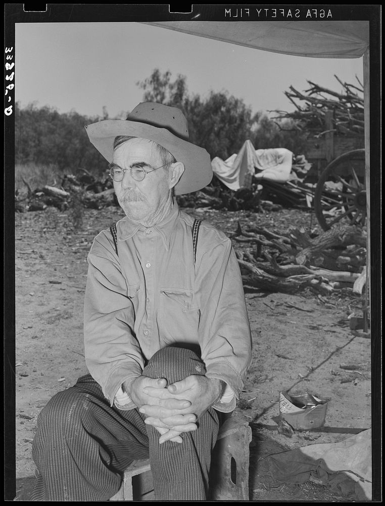 Old cowboy who was formerly employed at the SMS Ranch near Spur, Texas by Russell Lee