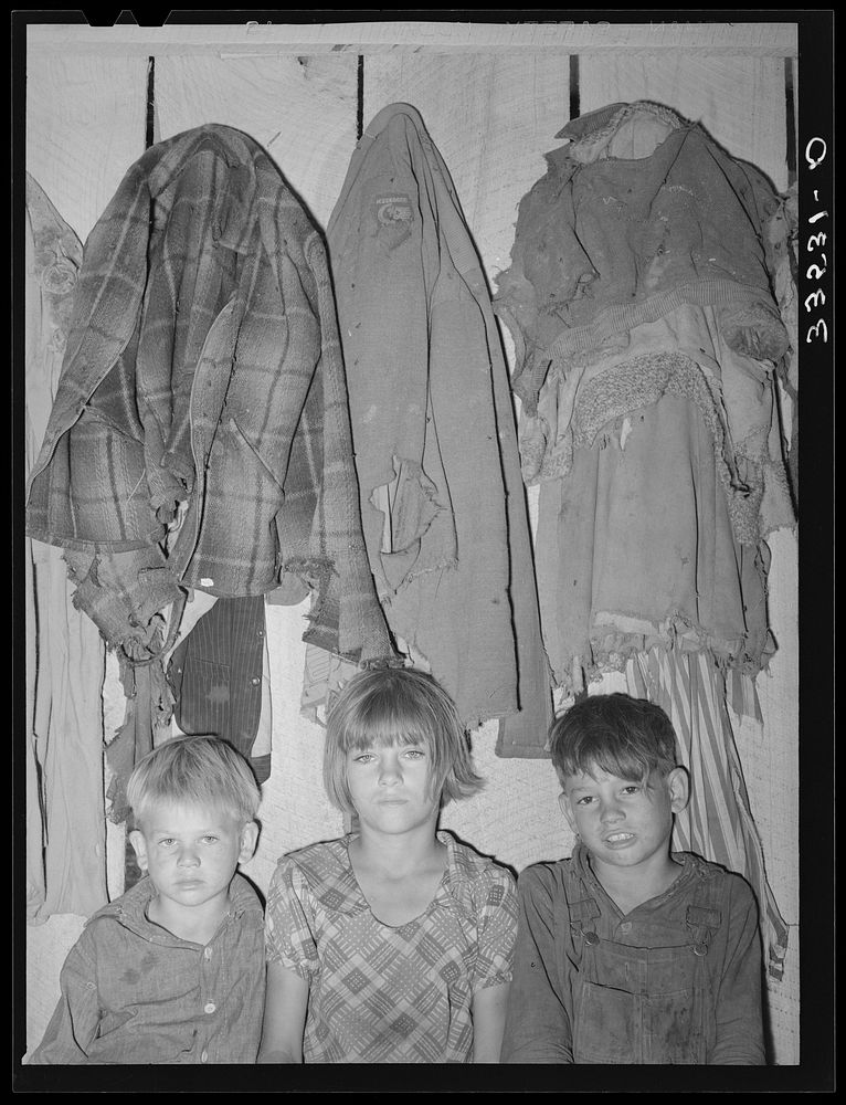 Children of white tenant farmer in their home in McIntosh County, Oklahoma by Russell Lee