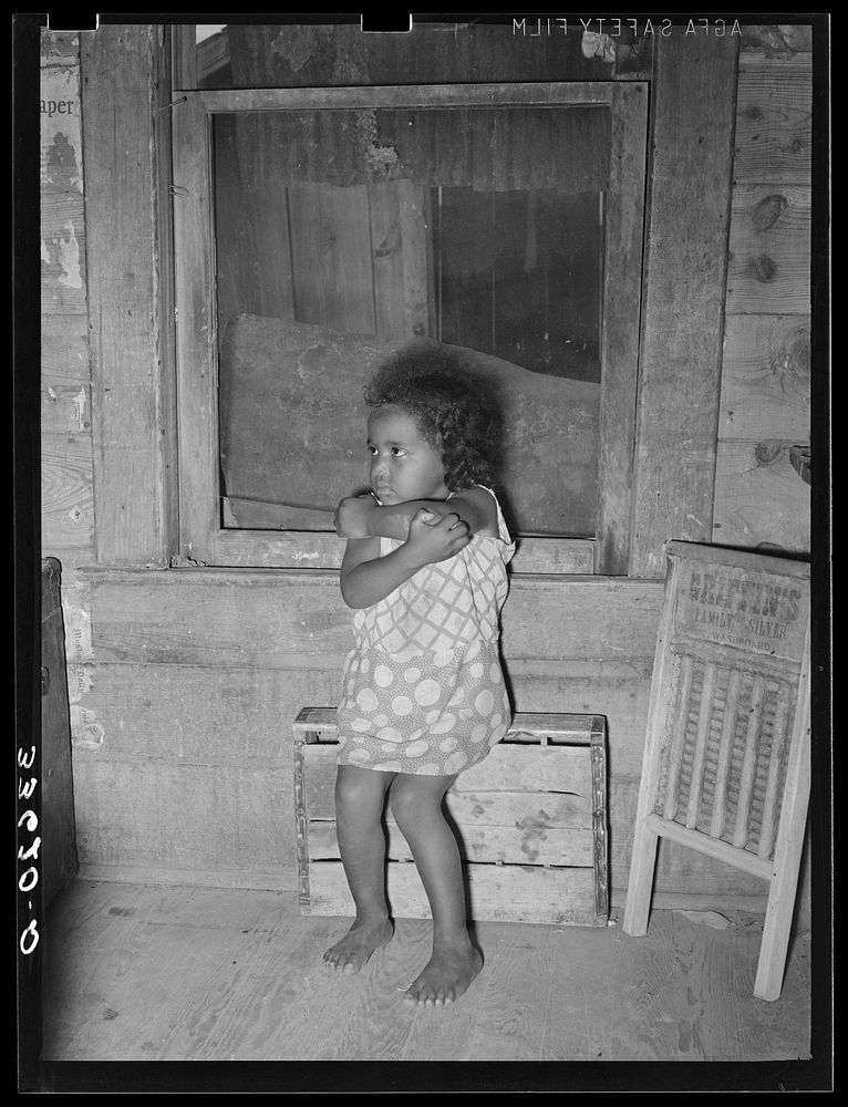 Daughter of tenant farmer scratching herself. Vermin as well as mosquitoes are numerous. Wagoner County, Oklahoma by Russell…