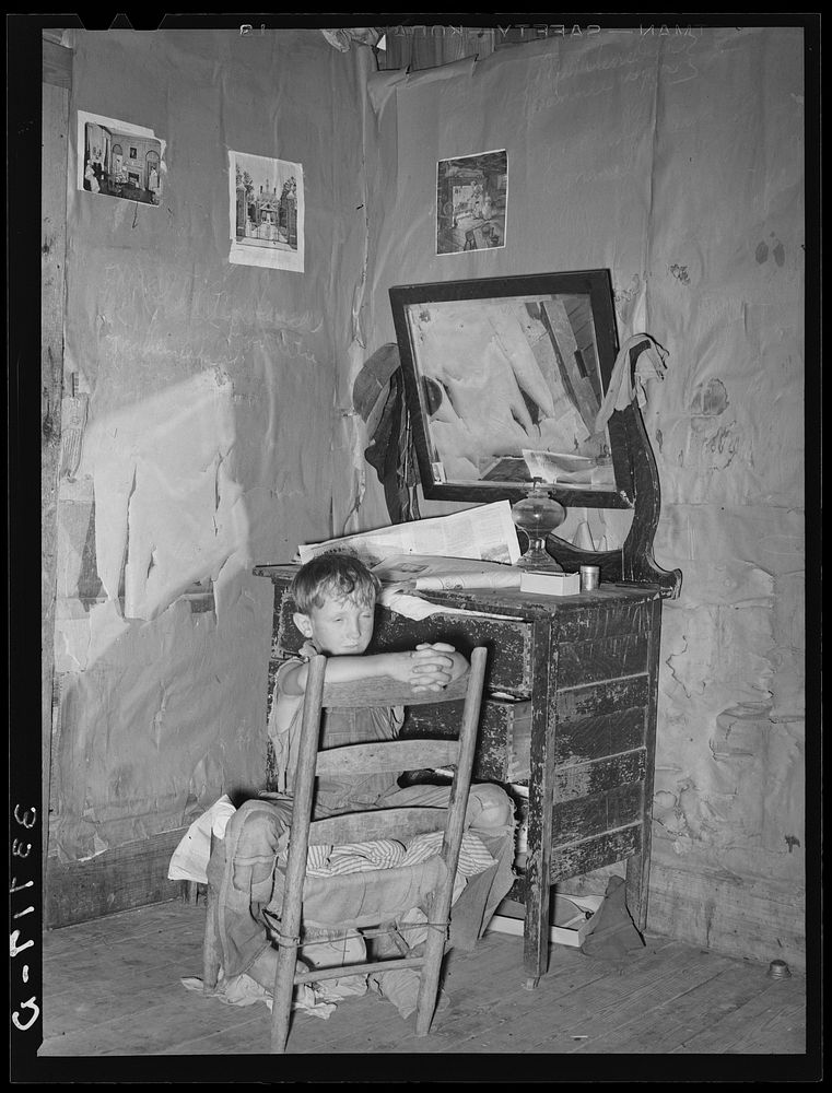 Corner of living room in home of agricultural day laborers living north of Sallisaw, Oklahoma. Sequoyah County by Russell Lee