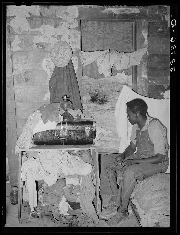 Crowd conditions in home of tenant farmer. Muskogee County, Oklahoma by Russell Lee