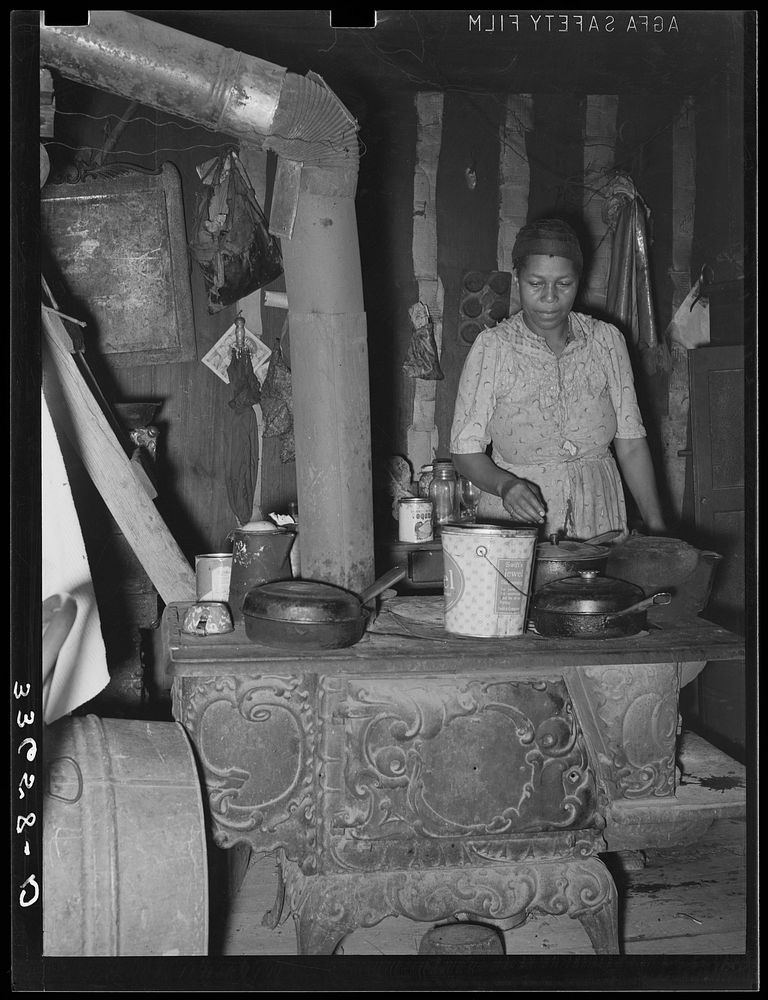 Kitchen of  agricultural day laborer. Wagoner County, Oklahoma by Russell Lee