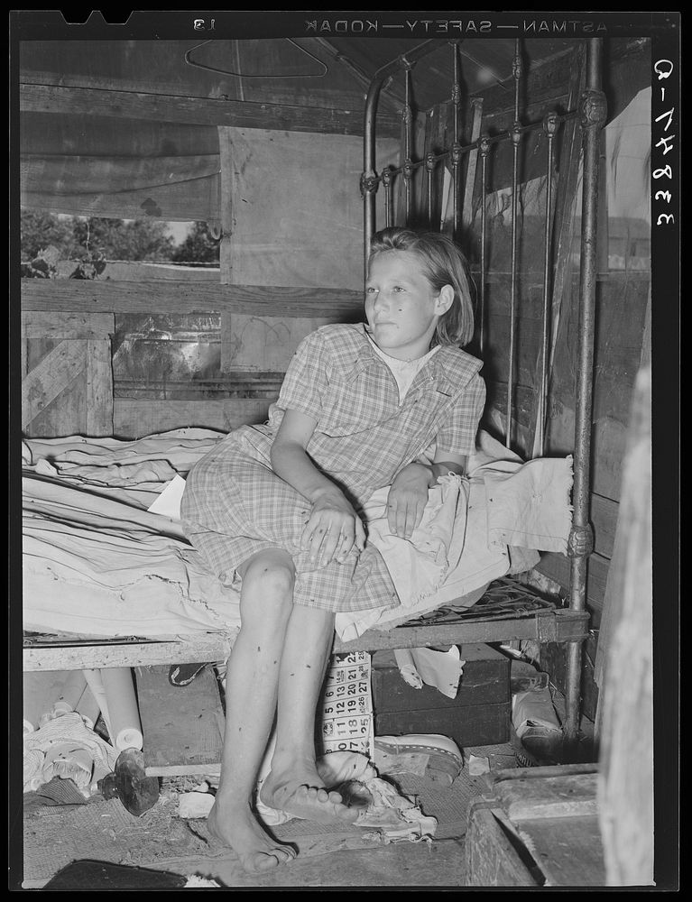 Daughter of family living in Mays Avenue camp. Oklahoma City, Oklahoma.  This family had been farmers in Oklahoma until four…