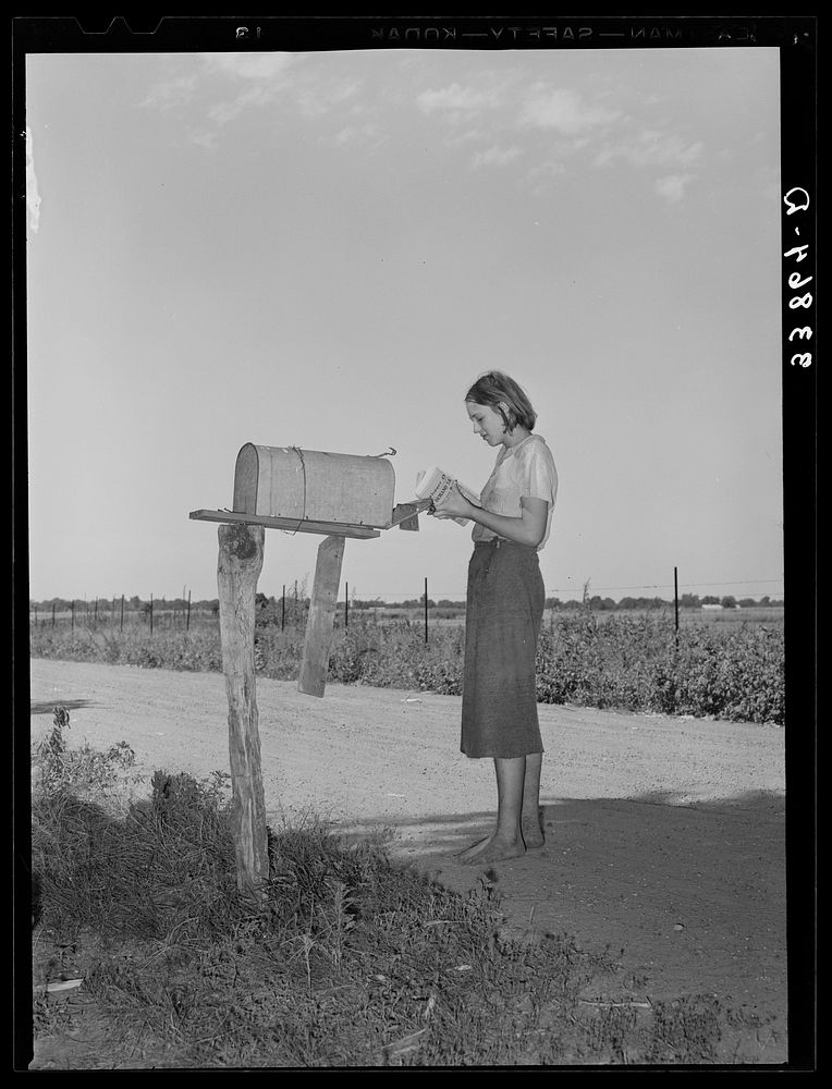 Daughter of tenant farmer living near Muskogee, Oklahoma, getting the morning mail. Refer to general caption number 20 by…