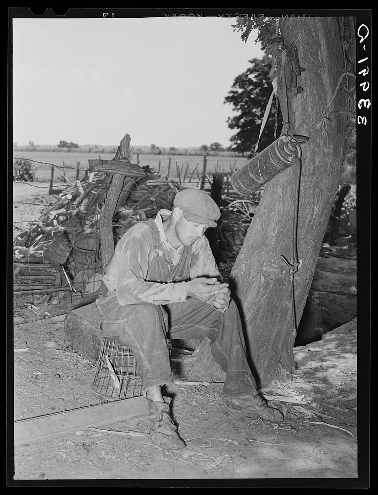 Son of tenant farmer in from fields. Notice sweated shirt. Near Muskogee, Oklahoma. See general caption 20 by Russell Lee