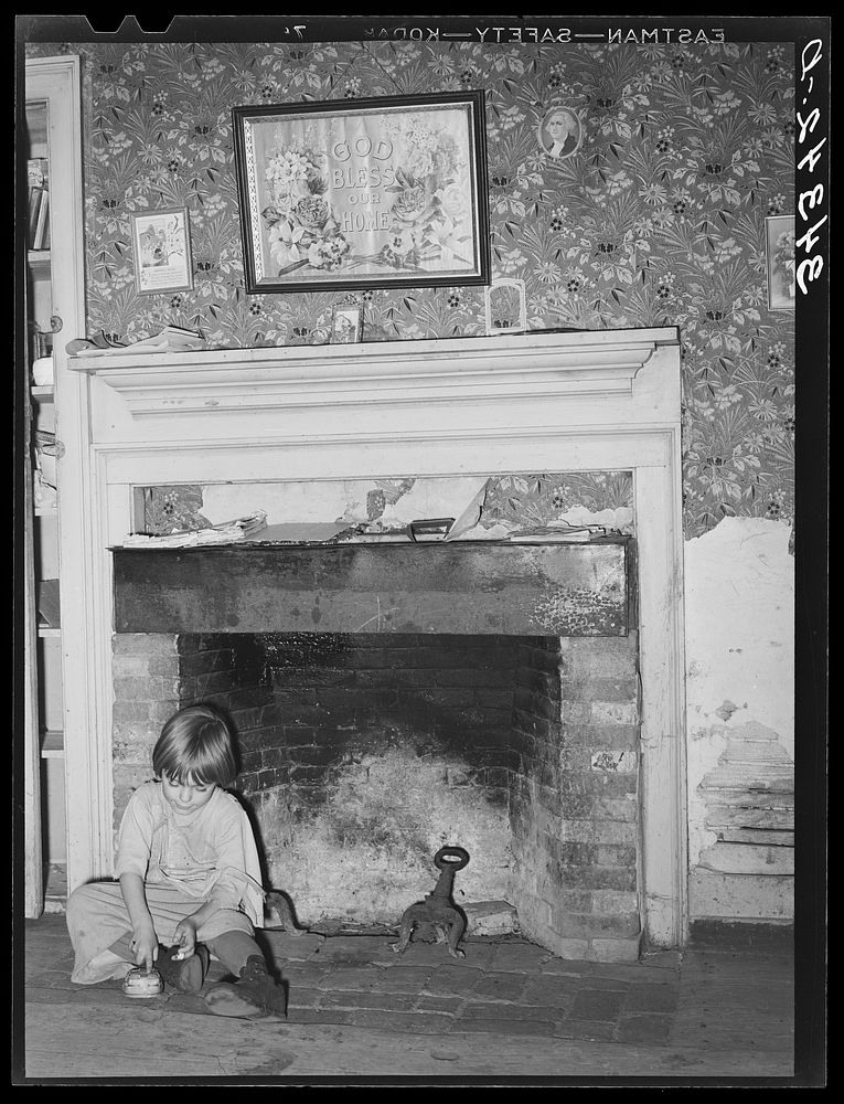 Fireplace in farm home of FSA (Farm Security Administration) client near Bradford, Vermont. Orange County by Russell Lee