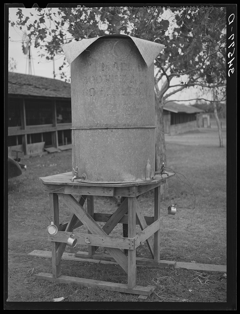 Temporary drinking fountain at Gonzales County Fair. Gonzales, Texas by Russell Lee