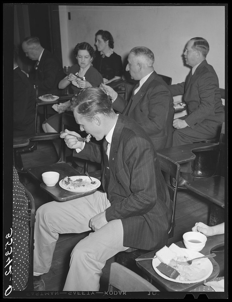 Man eating pie at the buffet supper of the Jaycees at Eufaula, Oklahoma. See general caption number 25 by Russell Lee