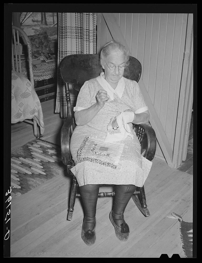 Mother of tenant purchase client piecing a quilt. Maricopa County, Arizona by Russell Lee