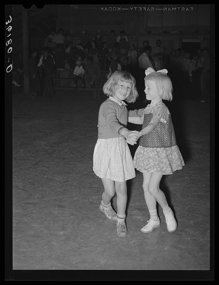 Two children of migrant agricultural workers dancing at the Saturday night dance at the Agua Fria migrant labor camp.…