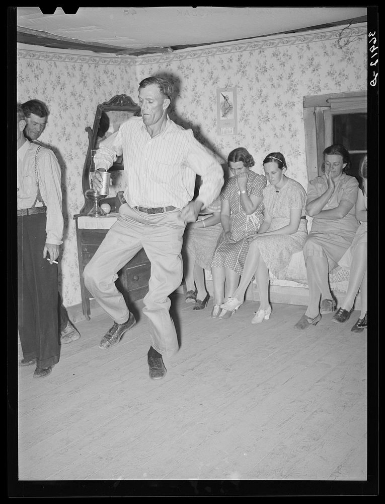 Jigger at the square dance. Pie Town, New Mexico by Russell Lee