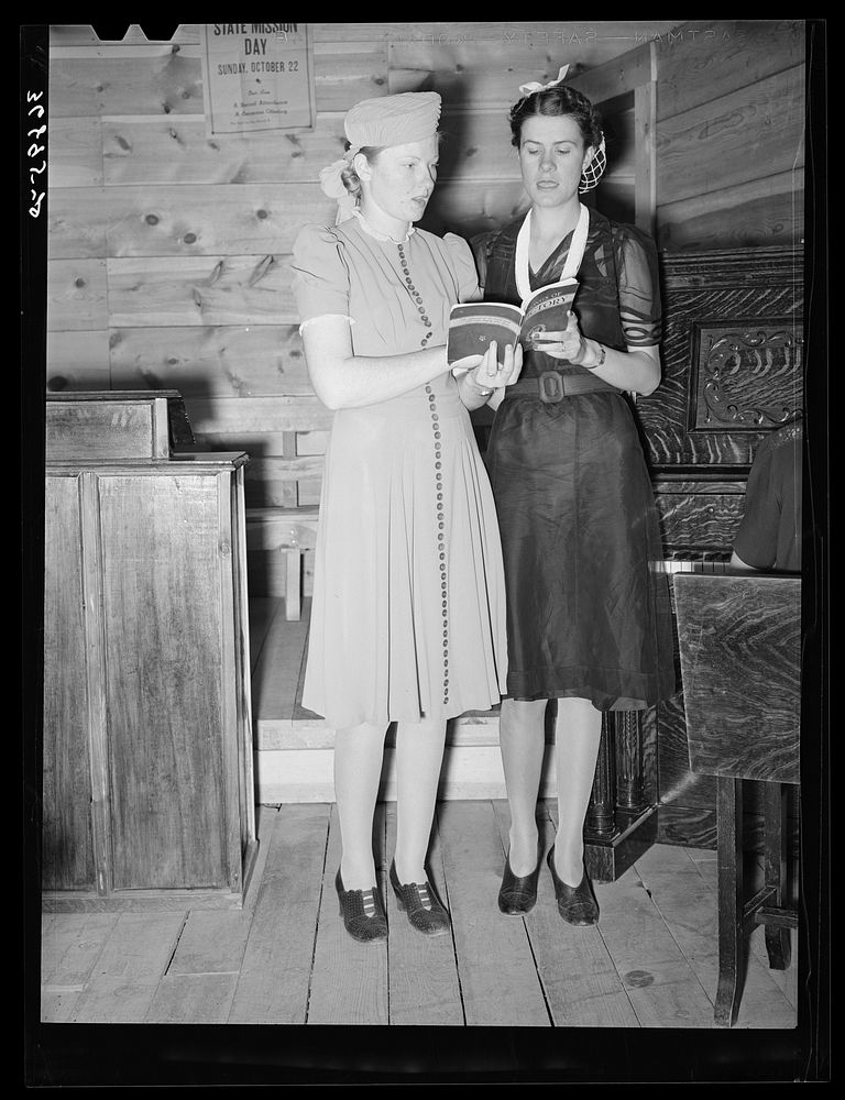 Duet at the community sing. Pie Town, New Mexico by Russell Lee